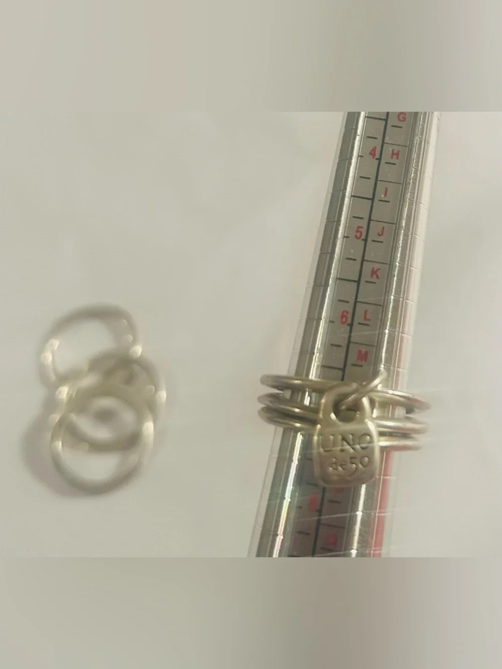 UNO de 50 Silver “prisoner”Multi-Ring Statement with Charm with Gift Pouch